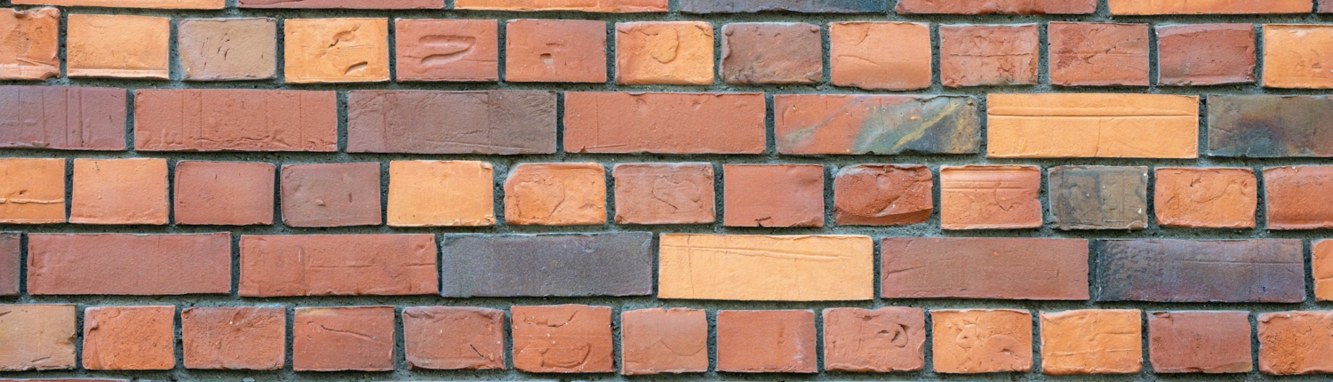 Wall made of dark red clinker bricks